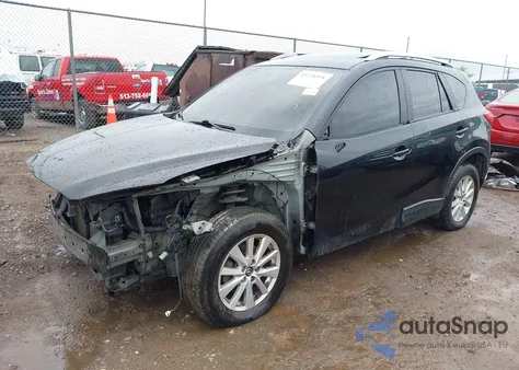 2014 Mazda Cx-5 Touring z USA, uszkodzony, nr VIN JM3KE4CY6E0367017
